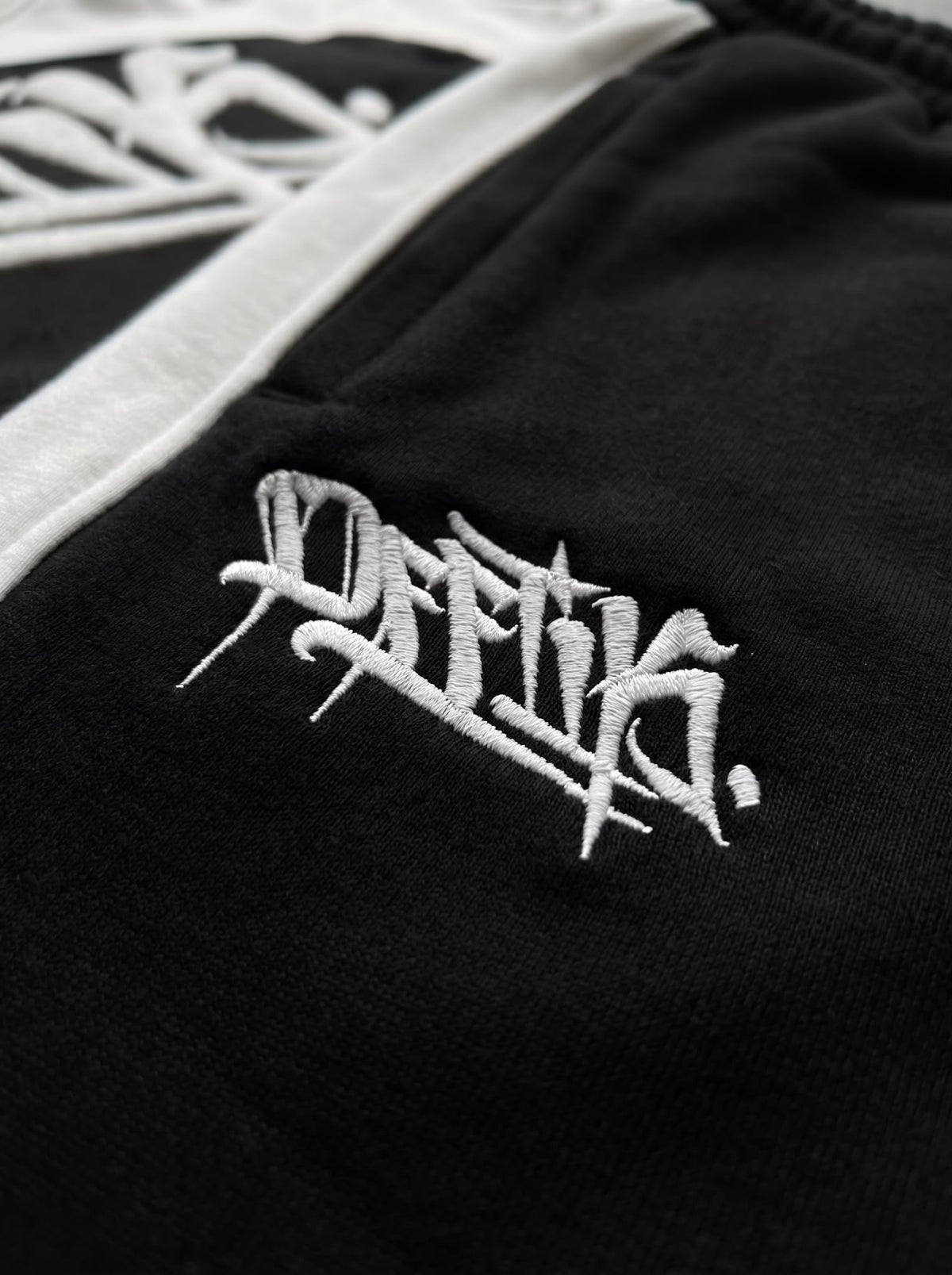 Black jacket with white embroidered logo on a black background, image 3