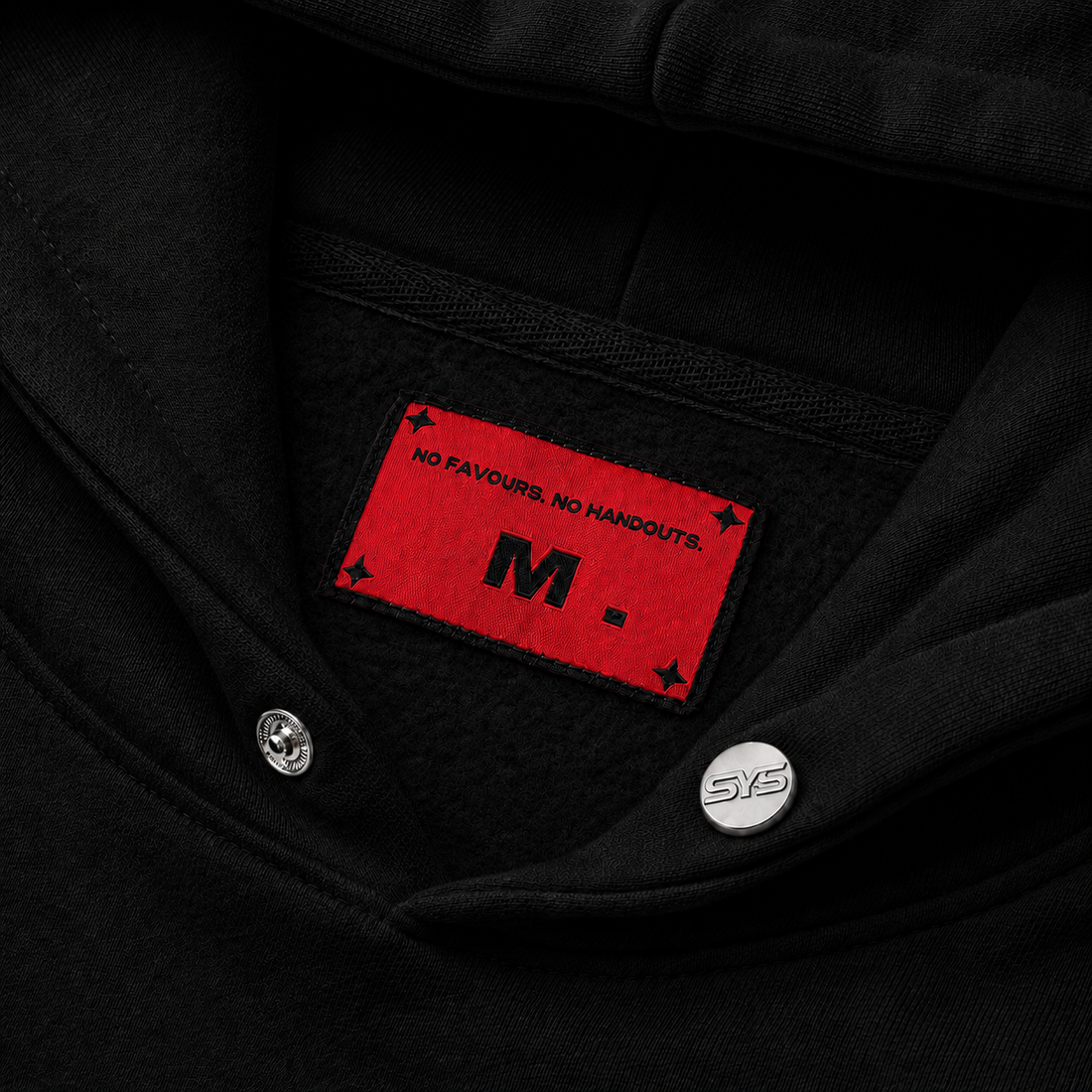 Black jacket with a red patch featuring text and a logo on the chest., image 5
