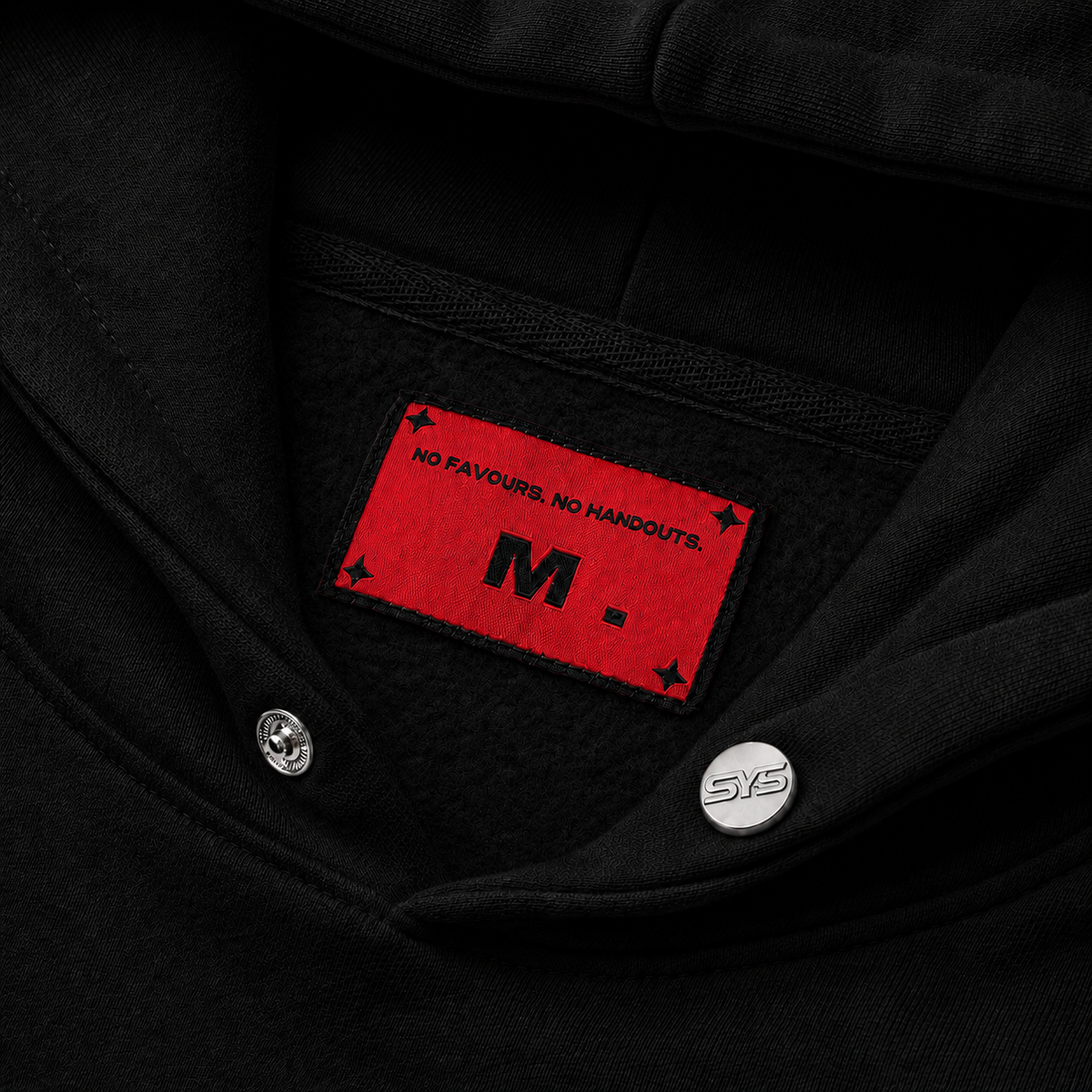 Black jacket with a red patch featuring text and a logo on the chest., image 5