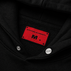Black jacket with a red patch featuring text and a logo on the chest.