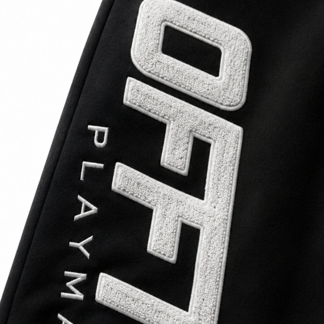 Black sleeve with white textured 'OFFTIK PLAYMAKER' branding on a white background, image 2