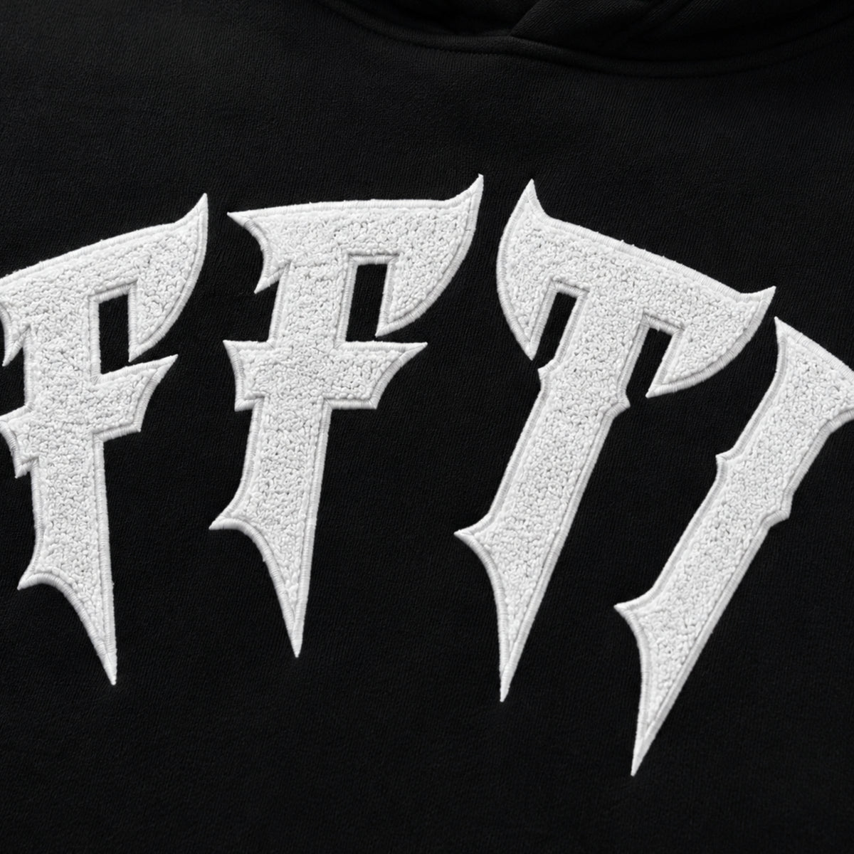 Close-up of a black hoodie with metallic 'FF7' logo., image 7