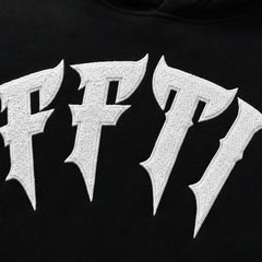 Close-up of a black hoodie with metallic 'FF7' logo.