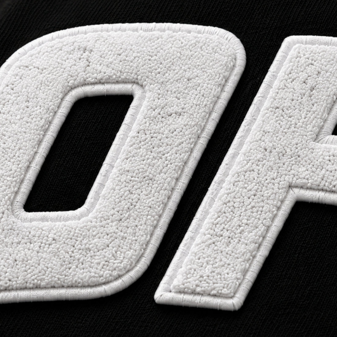 White textured letters on a black background, image 5