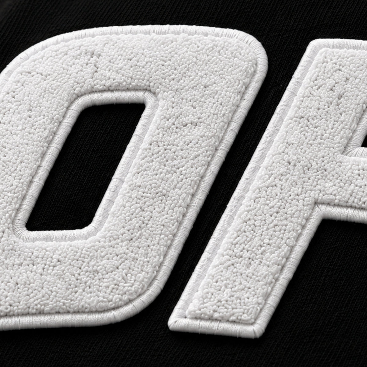 White textured letters on a black background, image 5
